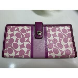COACH leather wallet purple signature pattern with snap closure